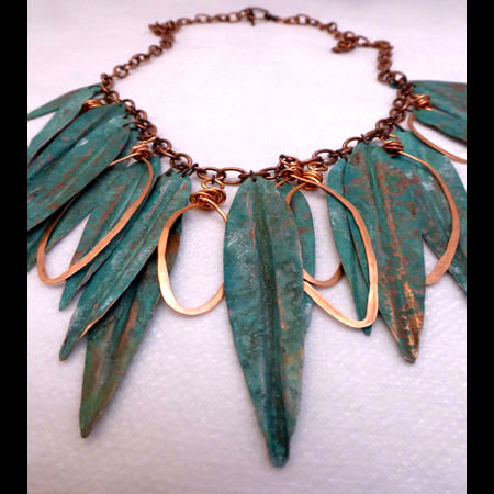 Patinaed copper leaves with hammered copper rings necklace